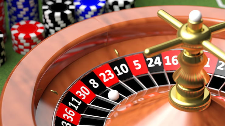 A close up of a roulette wheel.