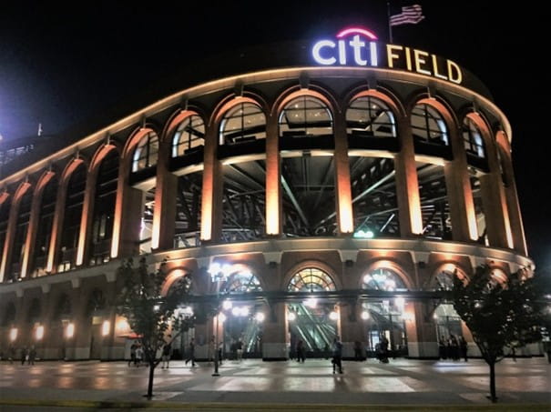 The outside entrance to Mets stadium Citi Field in the evening