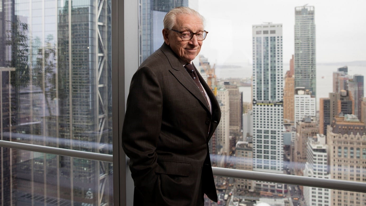 Real Estate investor Larry Silverstein standing with the New York skyline behind him